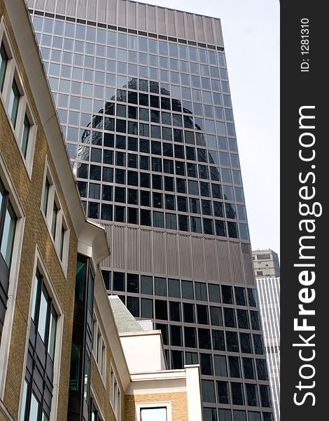 Building reflected in the city, London