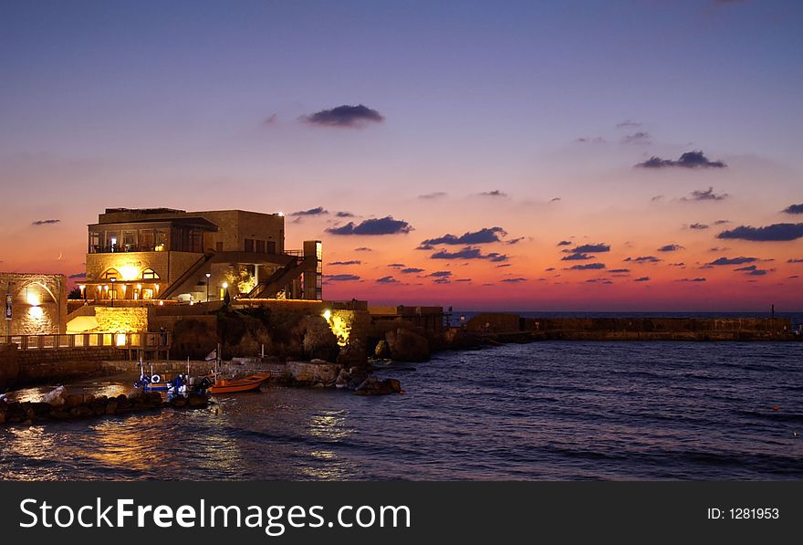 A restourant near  sunset Mediterranean sea. A restourant near  sunset Mediterranean sea