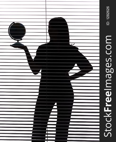 Silhouette of woman with globe (blind)