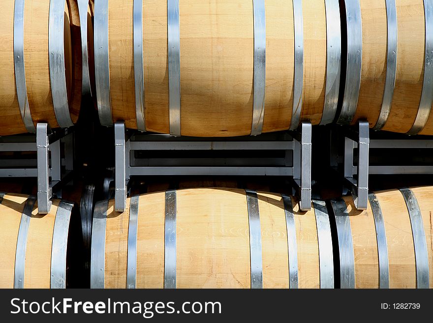 Six wine casks at a winery shot from the front. Six wine casks at a winery shot from the front.