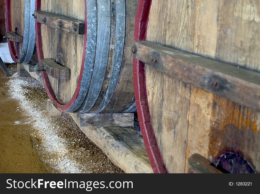 Wine fermenting in oak barrels. Wine fermenting in oak barrels