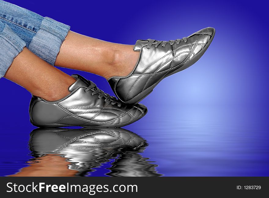 Silver footwear on the water