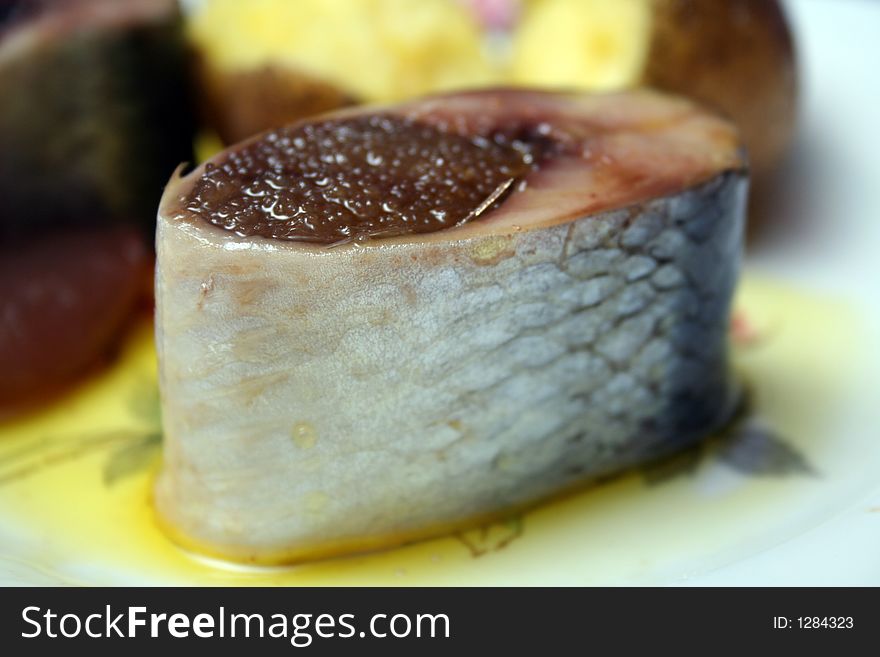 Sliced herring with cavair and potato