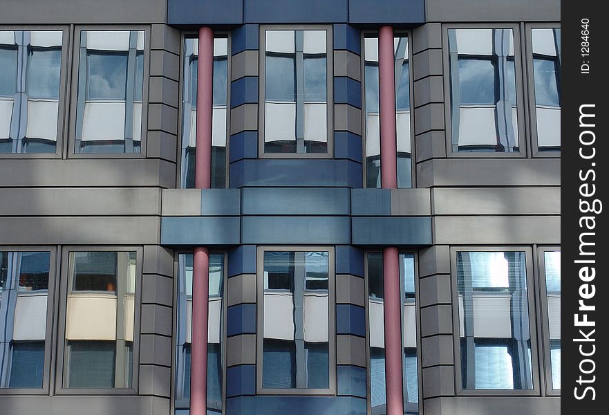 Modern stripy building with glass reflections. Modern stripy building with glass reflections