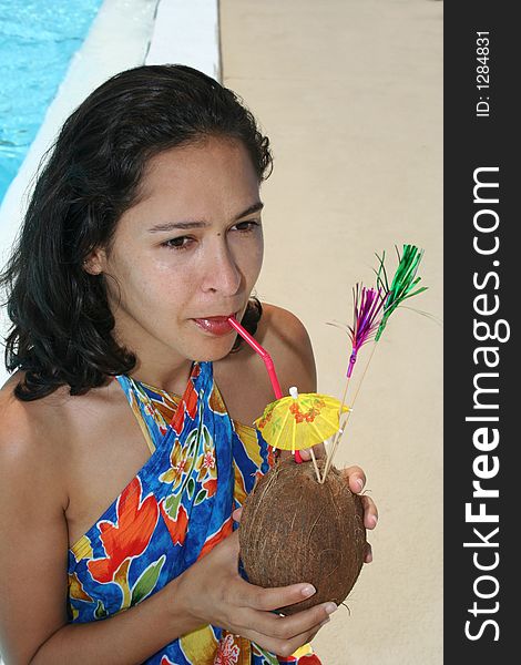 Girl drinking from a coconut. Girl drinking from a coconut