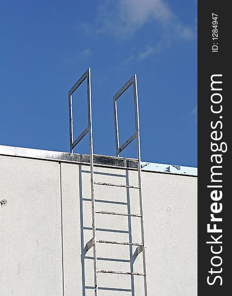 Industrial ladder to roof on back of restaurant