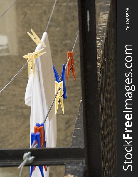 Washing hanging out to dry on a balcony in Milan, Italy. Washing hanging out to dry on a balcony in Milan, Italy