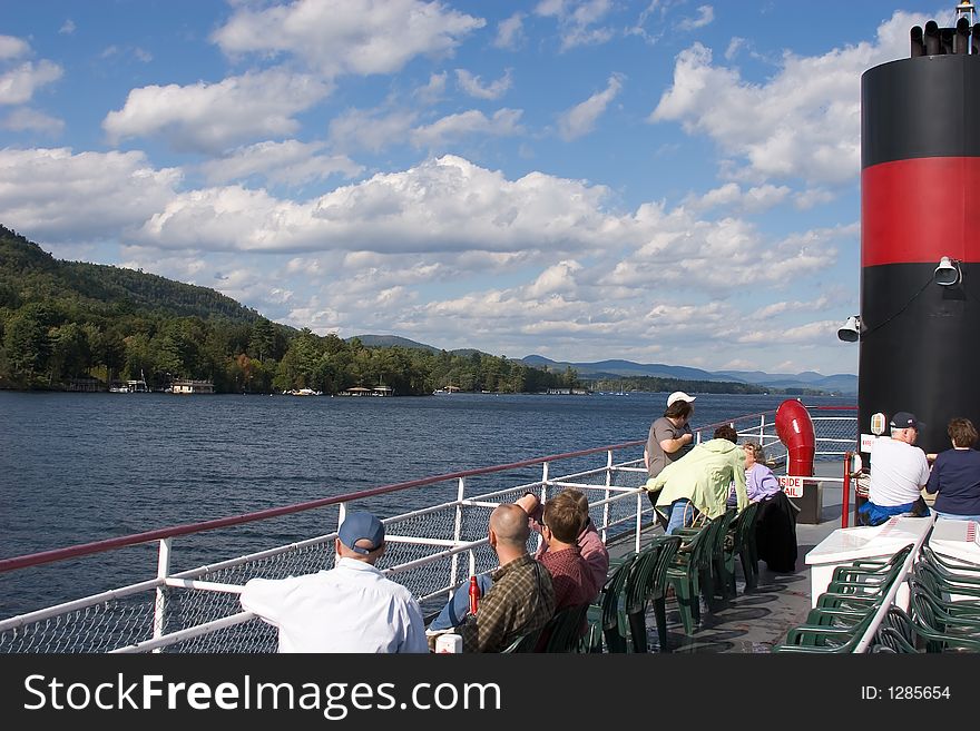 Ferry Boat with Passengers on Lake