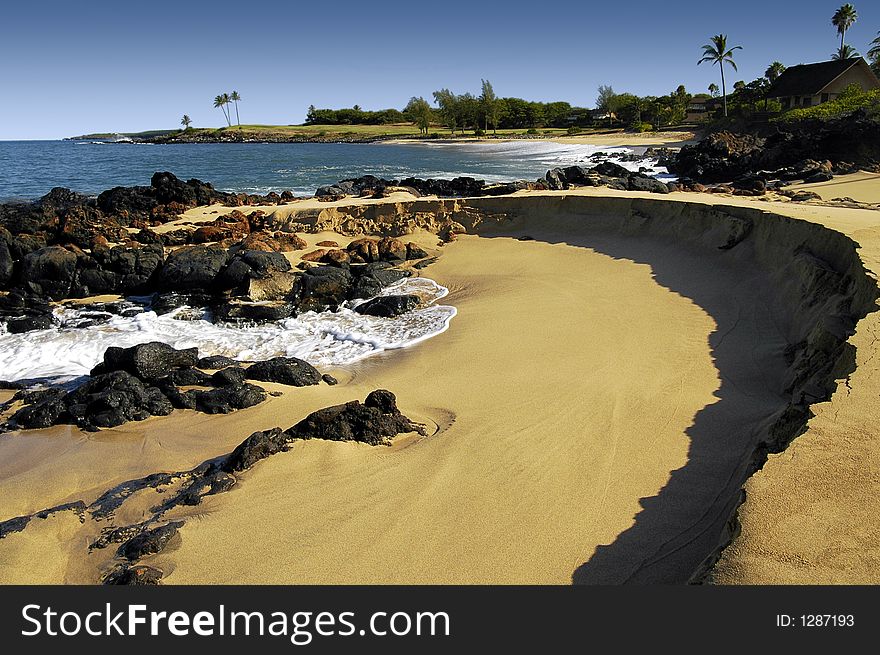 A beautiful sunrise on a beach in Molokai, Hawaii. A beautiful sunrise on a beach in Molokai, Hawaii