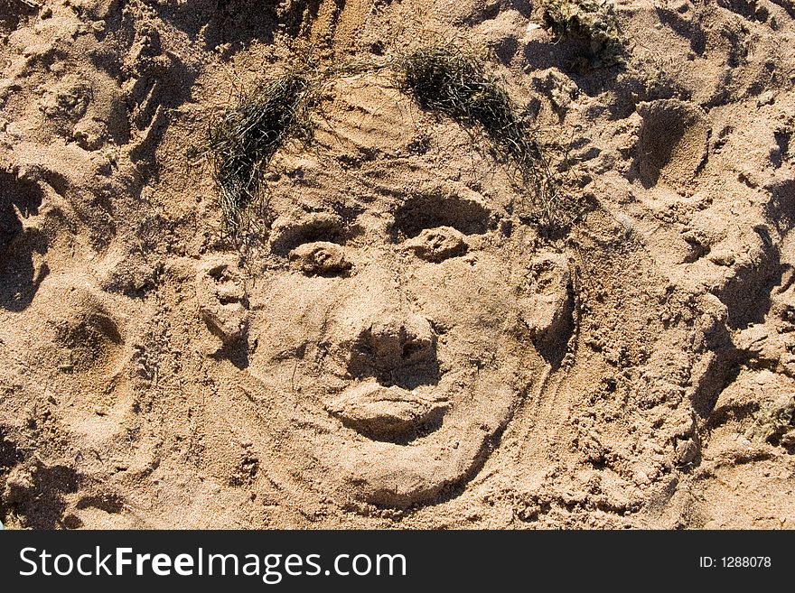 Sand face on the beach
