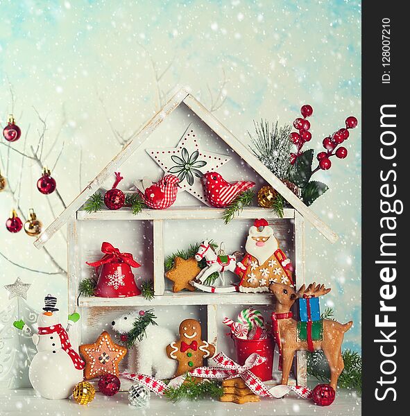 Christmas scene with white wooden house, presents, cookies, snowman and deers. Christmas scene with white wooden house, presents, cookies, snowman and deers