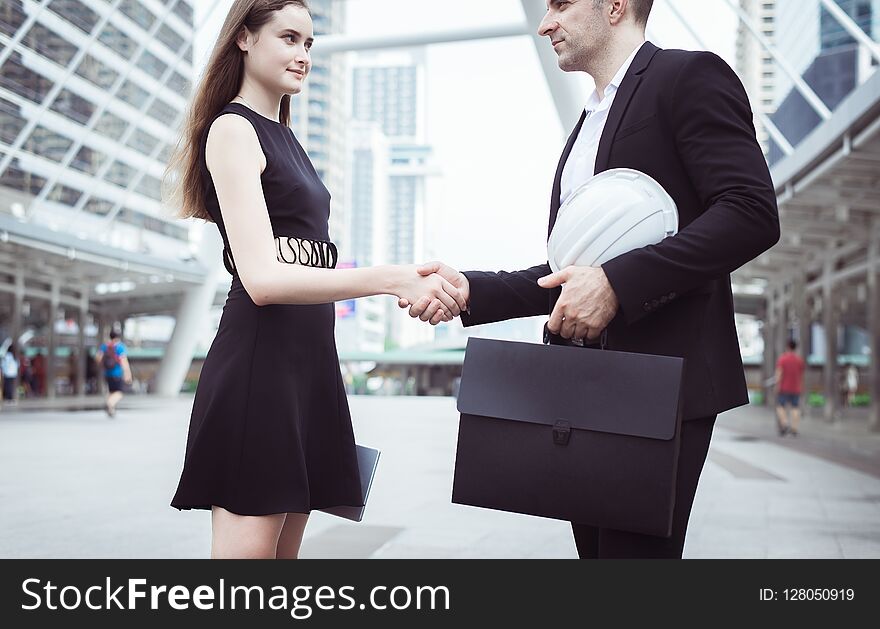 Business welcomes business partner shaking hands,Two People handshake