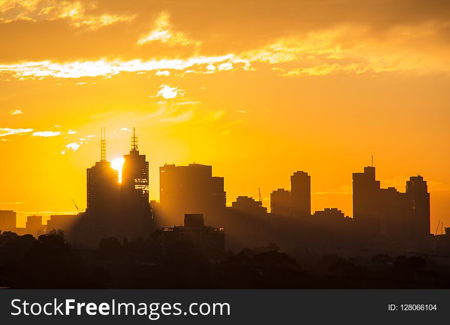 Sunset through Melbourne`s CBD district