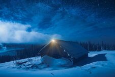 Lonely House On A Snow Hill In A Winter Valley Stock Photography