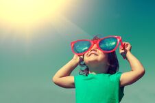 Happy Little Girl With Big Sunglasses Stock Photography
