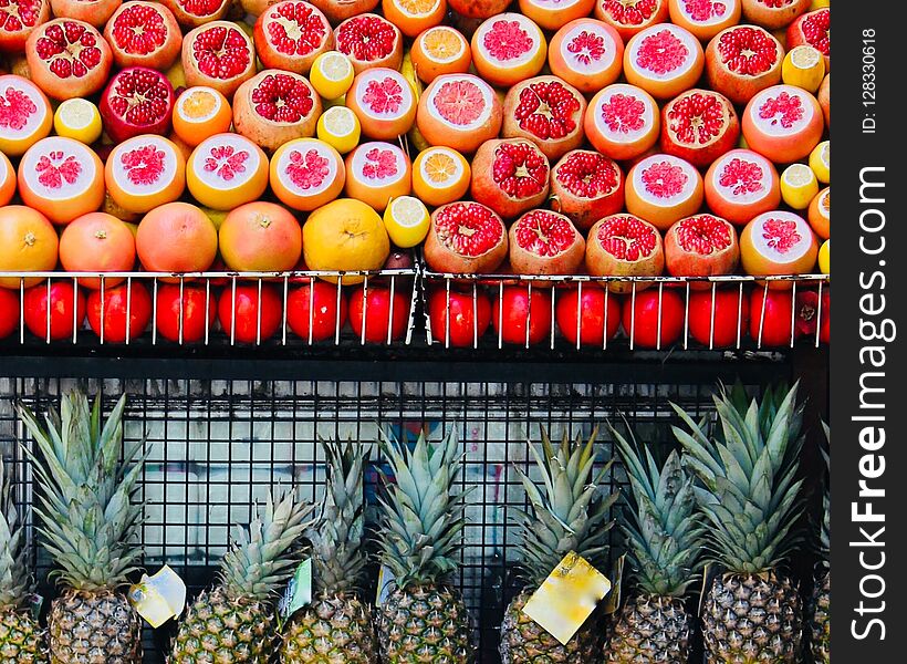 These exotic fruits : lemons, pomegranates, grapefruits, pineapples are exposed on the Istanbulâ€™s streets for making fresh juice for the sale