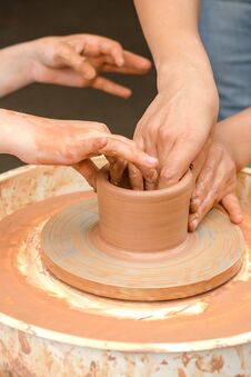 A Close-up Of The Child Learns To Knead The Clay Royalty Free Stock Photography