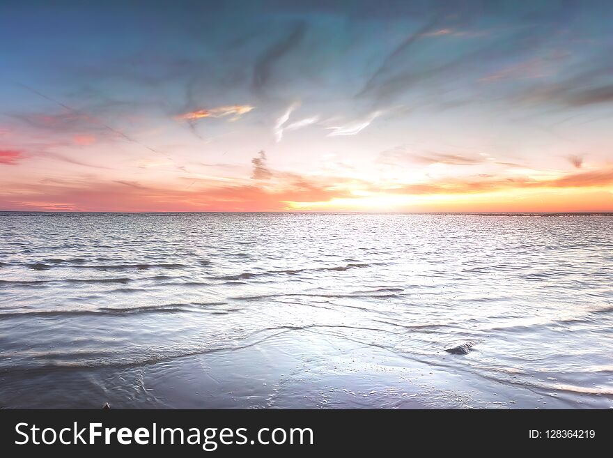 Sandy Beach With Rocks And Foaming. Estonia