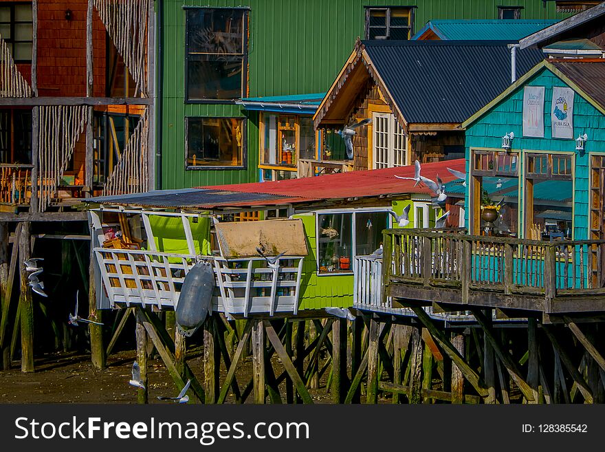 Beautiful coorful houses on stilts palafitos in Castro, Chiloe Island, Chile.