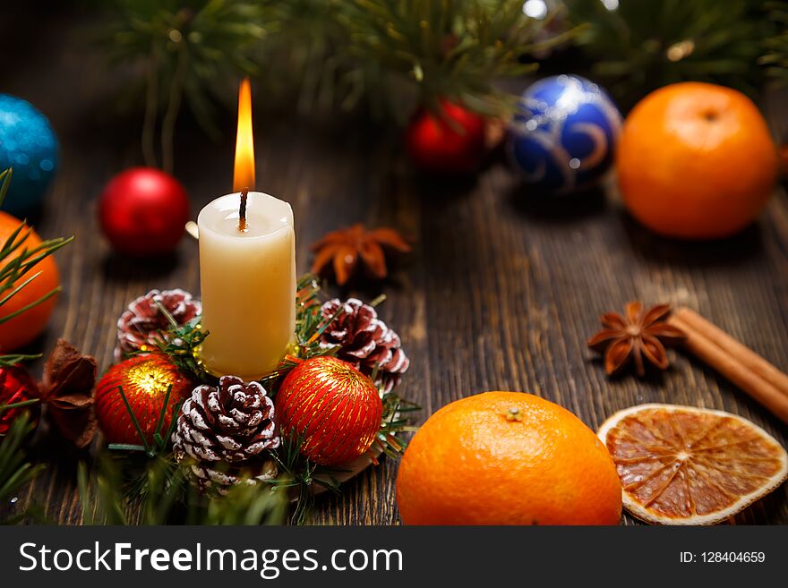 Christmas decoration with the burning candle