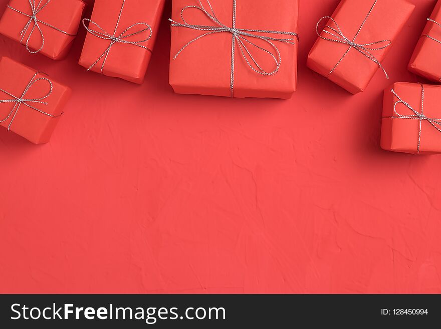 The Row Of Presents Wrapped In Red Craft Paper