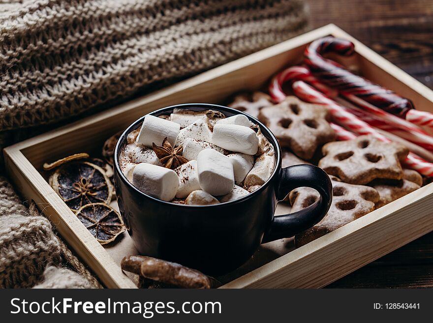 Christmas background with hot chocolate and sweets