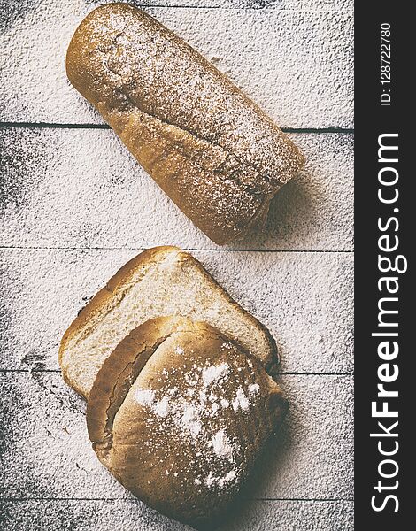 Bakery concept. Sliced bread and loaf of bread