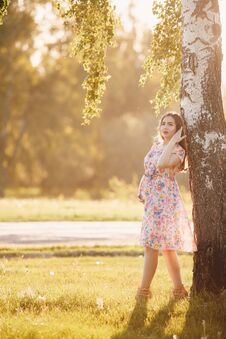 Pregnant Girl In A Light Dress Stock Photography