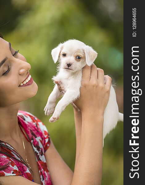 Young Woman With Puppy