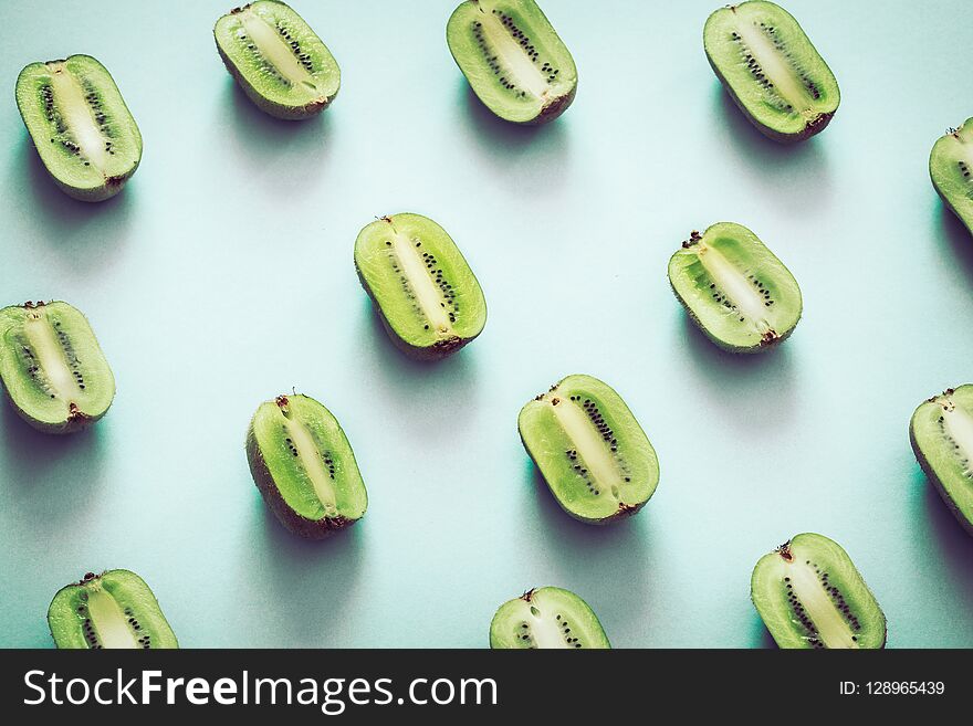 Fresh Halves Of Kiwi On A Blue Background