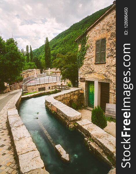 Rasiglia is a river-side town in Umbria, Italy. It`s unique in that rivers flow directly through the entire town, packed with lovely bridges and small footpaths. One of the many features is quotes that accompany their many fountains, all in celebration of water. Although busier in early-summer, as fall approaches, the town is quiet during the late-afternoon. Rasiglia is a river-side town in Umbria, Italy. It`s unique in that rivers flow directly through the entire town, packed with lovely bridges and small footpaths. One of the many features is quotes that accompany their many fountains, all in celebration of water. Although busier in early-summer, as fall approaches, the town is quiet during the late-afternoon.