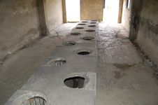 Auschwitz - Latrines Royalty Free Stock Photography Auschwitz - Latrines Royalty Free Stock Photography