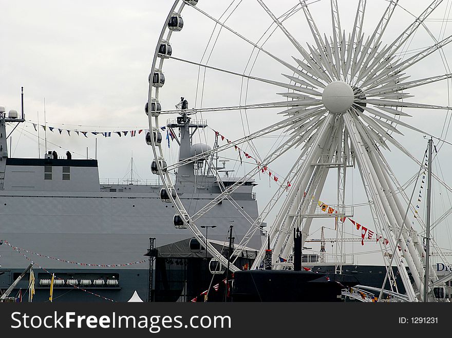 Ferris Wheel, Ship And Flags