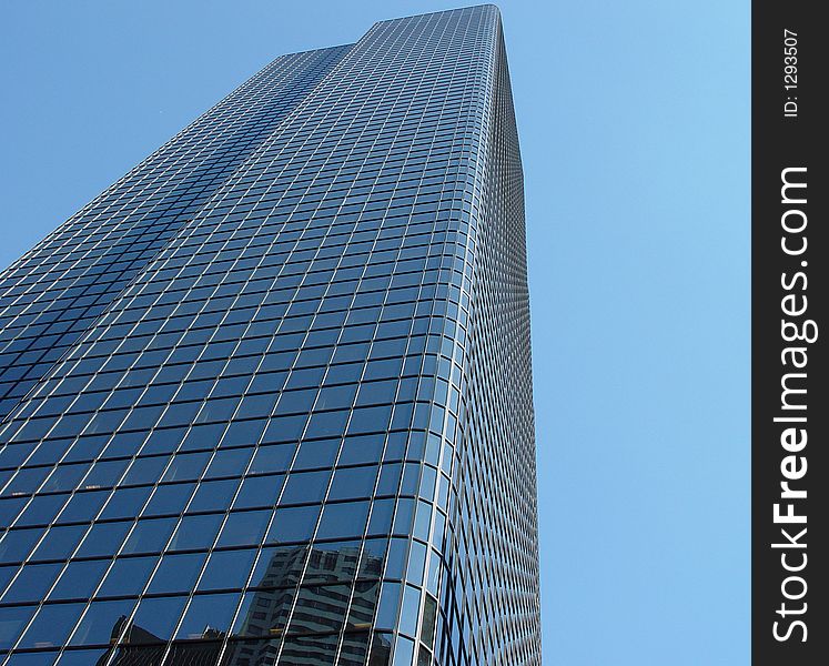 Reflective glass building in downtown Boston. Reflective glass building in downtown Boston.