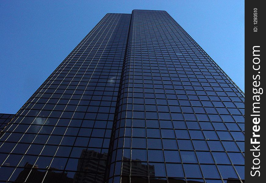 Reflective glass building in downtown Boston. Reflective glass building in downtown Boston.