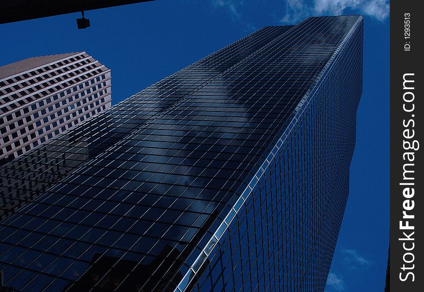 Reflective glass building in downtown Boston. Reflective glass building in downtown Boston.