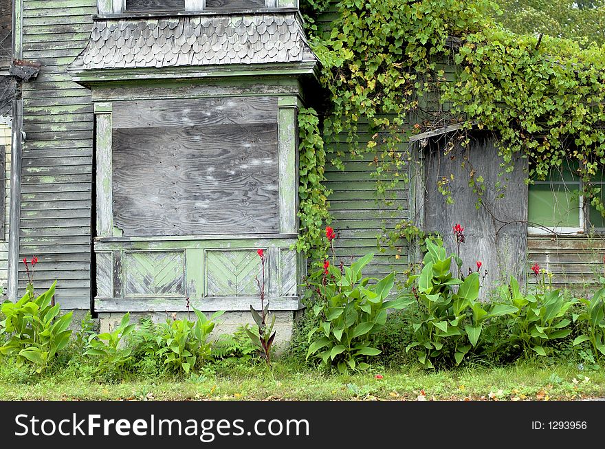 Boarded up old abandoned house could be haunted. Boarded up old abandoned house could be haunted