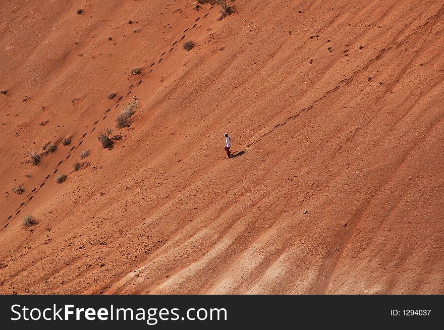 Girl comes down in red loam canyon. Girl comes down in red loam canyon