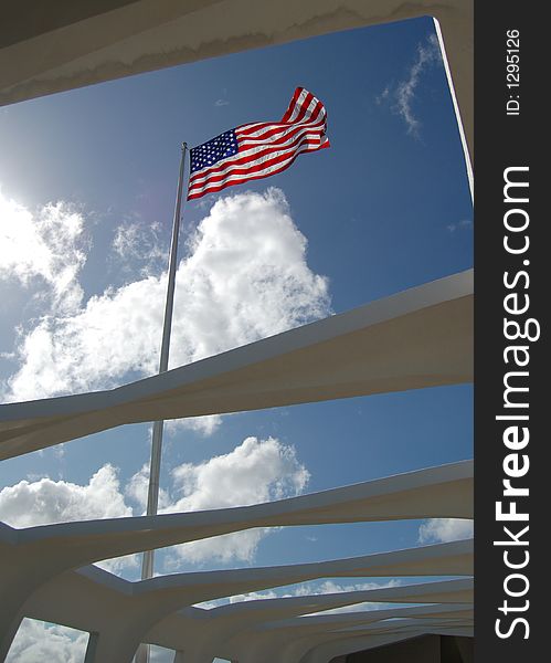 This is a picture of the flag flying over the U.S.S. Arizon Memorial at Pearl Harbor. This is a picture of the flag flying over the U.S.S. Arizon Memorial at Pearl Harbor.