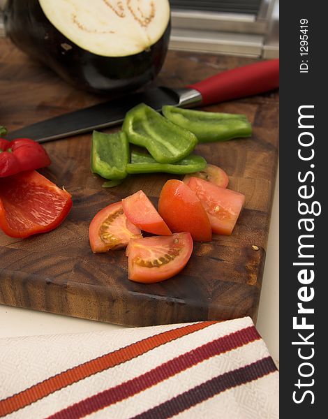 Fresh vegetables sliced on cutting board. Fresh vegetables sliced on cutting board