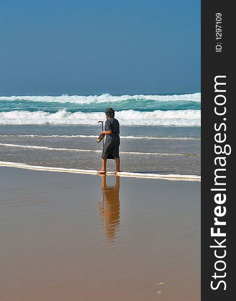 People at beach walking for exercise. People at beach walking for exercise