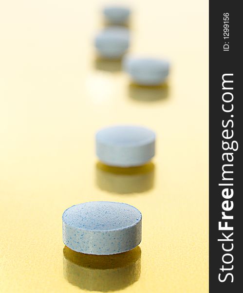 Line of vitamin and mineral pills