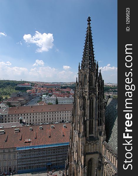 View from the Prague Castle in the Czech Republic with the cathedral tower in the foreground. View from the Prague Castle in the Czech Republic with the cathedral tower in the foreground