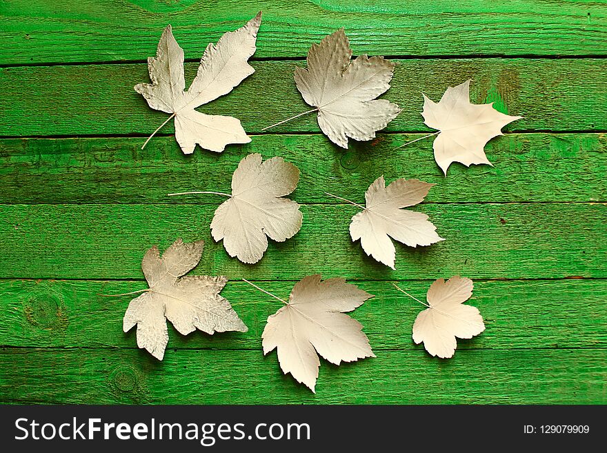 Green boards and white leaves