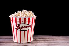 Popcorn In Full Retro Box On Wooden Rustic Desk Royalty Free Stock Photos Popcorn In Full Retro Box On Wooden Rustic Desk Royalty Free Stock Photos