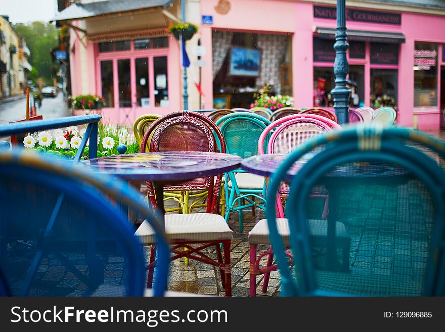 Colorful Tables And Chairs Of A French Cafe