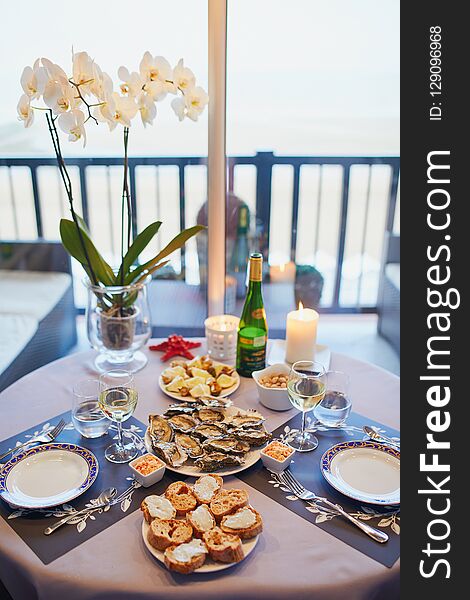 Delicious lunch with oysters served for two at home or in restaurant