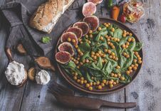 Chickpea, Spinach Leaves And Figs Vegetarian Salad, Cream Cheese, Healthy Homemade Vegan Food, Diet. Stock Image Chickpea, Spinach Leaves And Figs Vegetarian Salad, Cream Cheese, Healthy Homemade Vegan Food, Diet. Stock Image