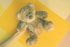Hand Holding Teddy Bear On Multi Color Background Creative Concept F Stock Photo