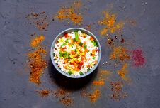 Rice With Vegetables And Spices On Dark Blue Concrete Background. Vegetarian Food, Products For Proper Nutrition, Close Up Stock Photo Rice With Vegetables And Spices On Dark Blue Concrete Background. Vegetarian Food, Products For Proper Nutrition, Close Up Stock Photo